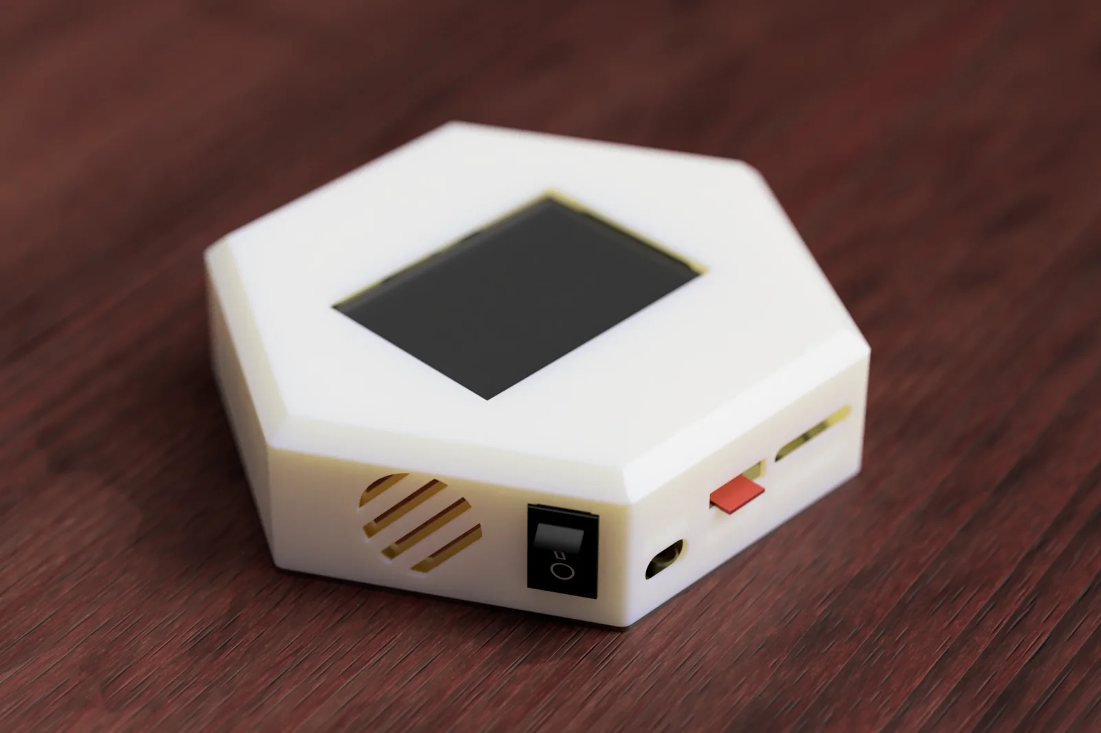 A Nimbus device: a white hexagonal desk unit with a screen, speaker grille, power switch and USB-C port, on a wooden desk.